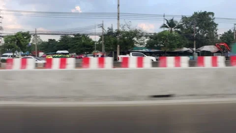 View from the window of a moving car on the traffic on the highway Stock Footage 345057251