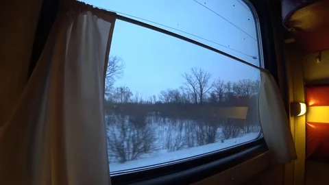 View from the window of a moving long-distance passenger train Stock Footage 89034639