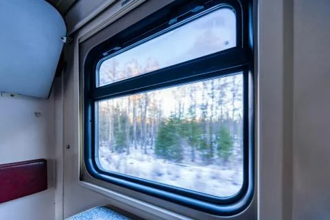 View of the window of a moving passenger train. Stock Photos