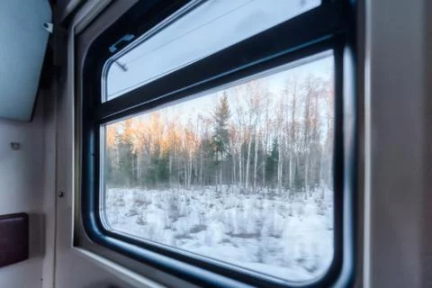 View of the window of a moving passenger train. Stock Photos