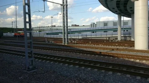 View from the window of a moving train on the intersecting overpasses and  .. Stock Footage 76449856