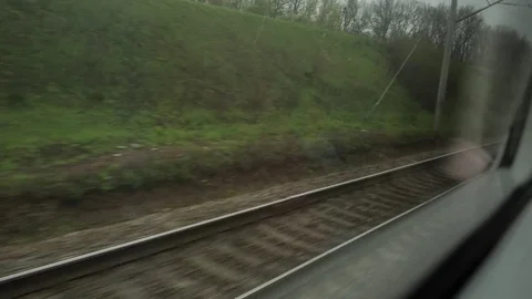 View from the window of moving train. Railroad in the view. Stock Footage 81356813