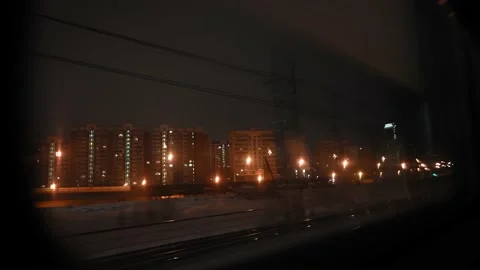 View From Window Moving Train on Railroad At Night. Travel and tourism concept Stock Footage 236899580