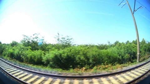 View from the window of a moving train shot on a wide-angle lens. Stock-Footage 94577814