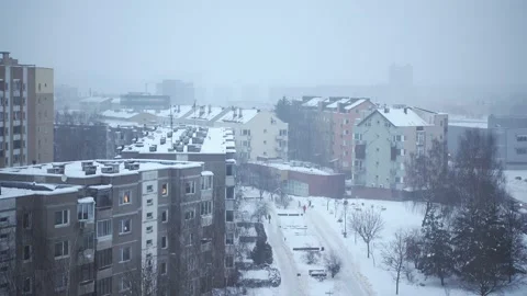 View from the window of multistory building to city in winter day during Stock Footage 148079877