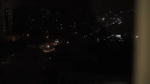 View from the window of the night city. New Year holidays Видео 255704785