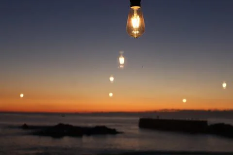 View from the window to the ocean at sunset. Stock Photos
