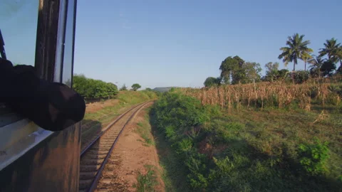 View From Window Of Old Blue Train Moves On Countryside ，Tanzania Stock Footage 132545141