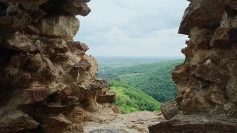 View from the window of the old brick fortress on the mountain landscape. Video stock 250433887