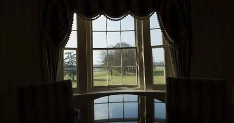 A View Into A Window Of An Old Mansion Onto Beautiful Park Stock Footage 107558852