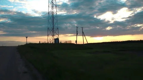 View from the window of a passing car at sunset Stock Footage 76565052