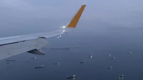 View from window plane on Bosphorus and ships on the water. Evening, lights Stock Footage 251322782