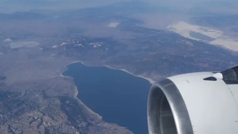 The view from the window of the plane. Close-up of a turbine. Stock Footage 233580173