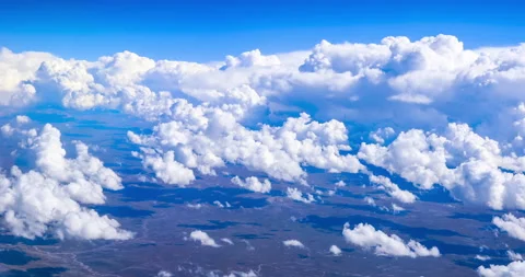 View from the window of the plane at the clouds in the sky. Stock Footage 160093213