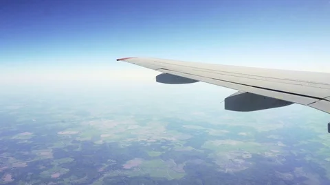 View from the window of the plane. Flight over the ground. Stock Footage 89778667