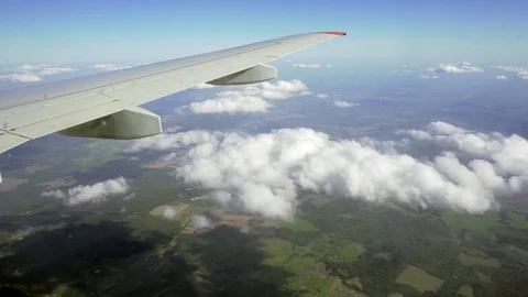 View from the window of the plane. Flight over the ground. Stock Footage 89778902