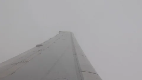 The view from the window of the plane inside the cloud. Stock Footage 128747624