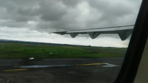View from the window of plane ready to Take off during gloomy day Stock Footage 275351454