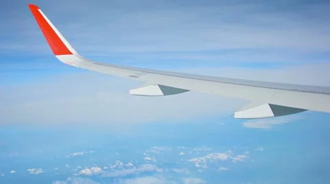 View from the window of the plane. seen wing and clouds Stock Footage 40975661