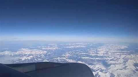 View from the window of the plane at the white clouds in the sky Video stock 123283433