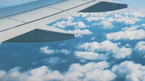 The view from the window of the plane on the wing and clouds. Stock-Footage 113792521