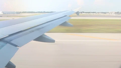 View From Window Of Plane Wing During Takeoff Sunny Right to Left Stock-Footage 102503256