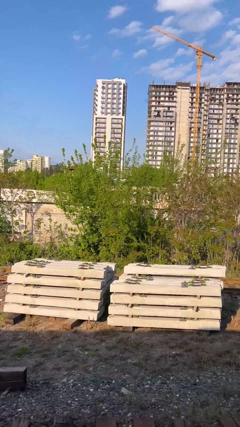 View from window of railway passenger train carriage of house construction Stock Footage 333273779
