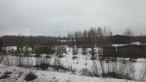 View from the window of a railway train at the abandoned GULAG colony Video stock 153427209