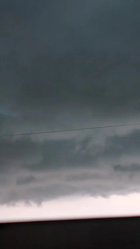 View from the window with rain clouds and lightning, sky timelapse Stock Footage 303345487