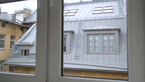 View from the window on the roof and windows of the house opposite Stock-Footage 171322353