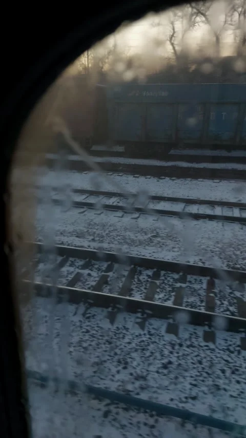 View from the window of a Russian Railways train on the track and station Stock Footage 264429432