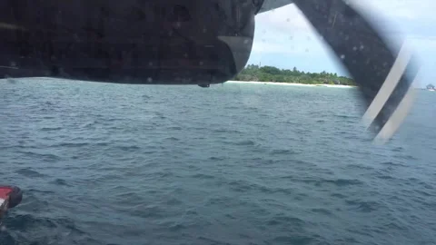 View from the window of the seaplane to the ocean Video stock 291676388