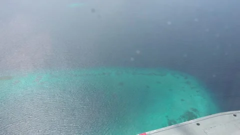View from the window of the seaplane to the ocean Video stock 291676754