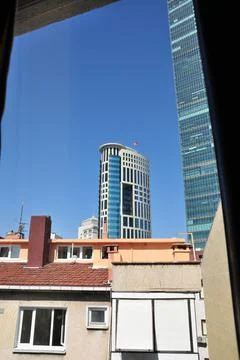 View from the window to the skyscraper. Stock Photos