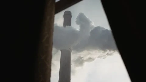 View from the window on the smoking pipes of the heating plant Stock Footage 198866942