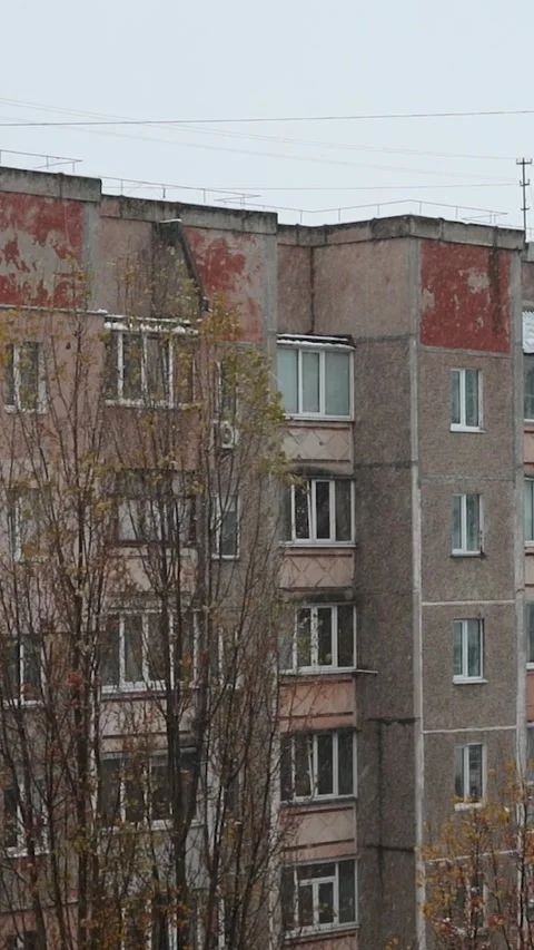 View window on snowy winter in city. Architecture eastern europe, soviet union Stock Footage 293083770