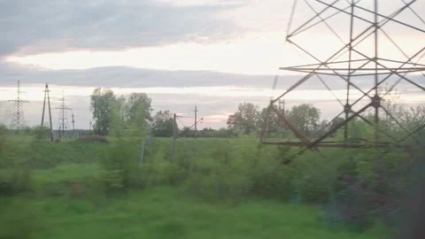 View from window of speed train with glare on glass and parallel rails on Stock Footage 156063988