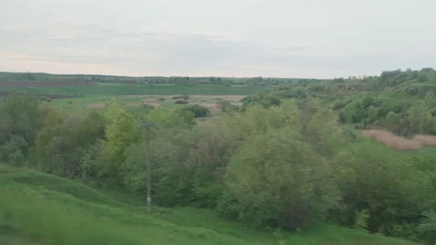 View from window of speed train with glare on glass and parallel rails on Stock Footage 156166801
