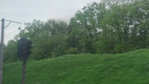 View from window of speed train with glare on glass and parallel rails on Video stock 156268847