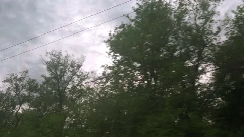 View from window of speed train with glare on glass on beautiful landscape of Stock Footage 156428644