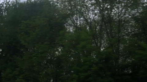 View from window of speed train with glare on glass on beautiful landscape of Stock Footage 157454965