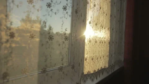 View from window on the sunrise through the curtains Stock Footage 104420665