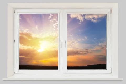 View from the window sunset in cloudy sky Stock Photos