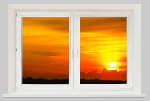View from the window sunset in cloudy sky Foto stock