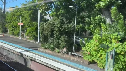 View from the window of a Sydney train Stock Footage 274459452
