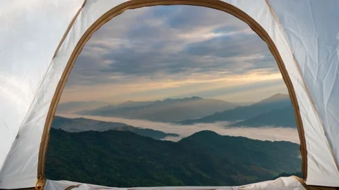 View from the window of tourists in tents lying on top In the morning there w Stock-Footage 169089340