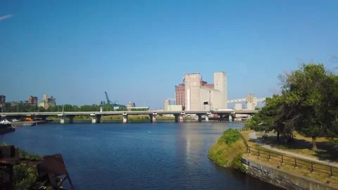 View from the window of a train crossing the water chanal on the bridge. Stock Footage 318189714