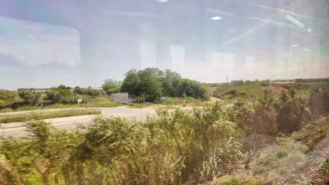 View from the window of the train going to Barcelona, coastline trip in Spain, 4 Stock Footage 276448278