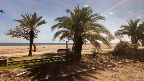 View from the window of the train going to Barcelona, coastline trip in Spain, 4 Stock Footage 276448285