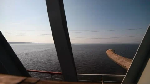 The view from the window of the train passing the bridge on a sunny day. Stock Footage 131342215
